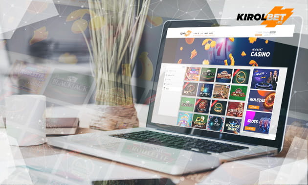 Ordenador portátil sobre una mesa con la página web del casino Kirolbet.